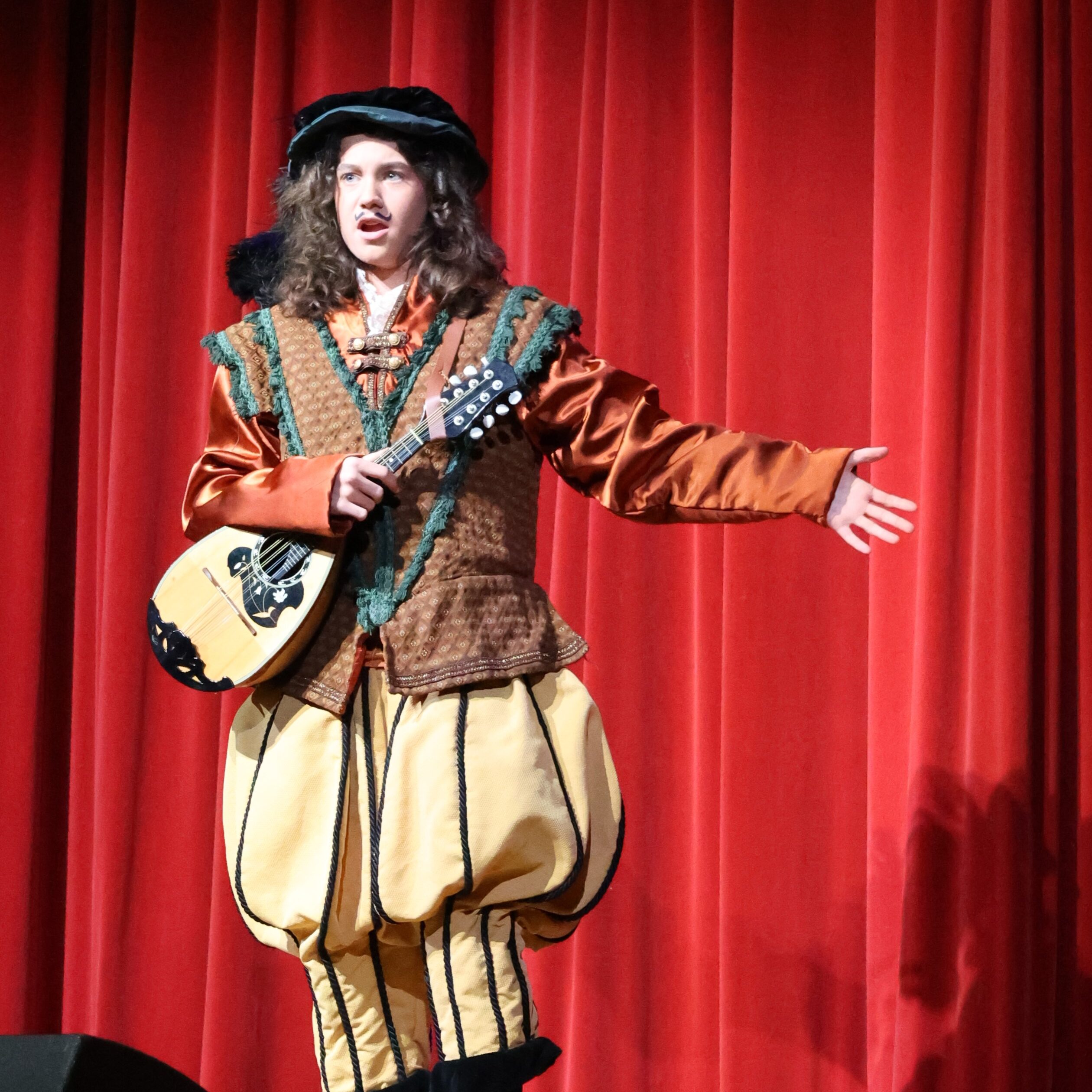 Student performing as the minstrel