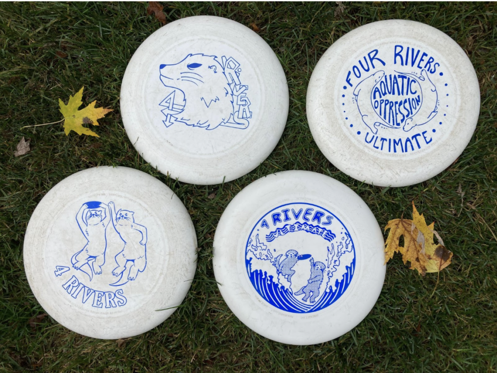 Four designed frisbees